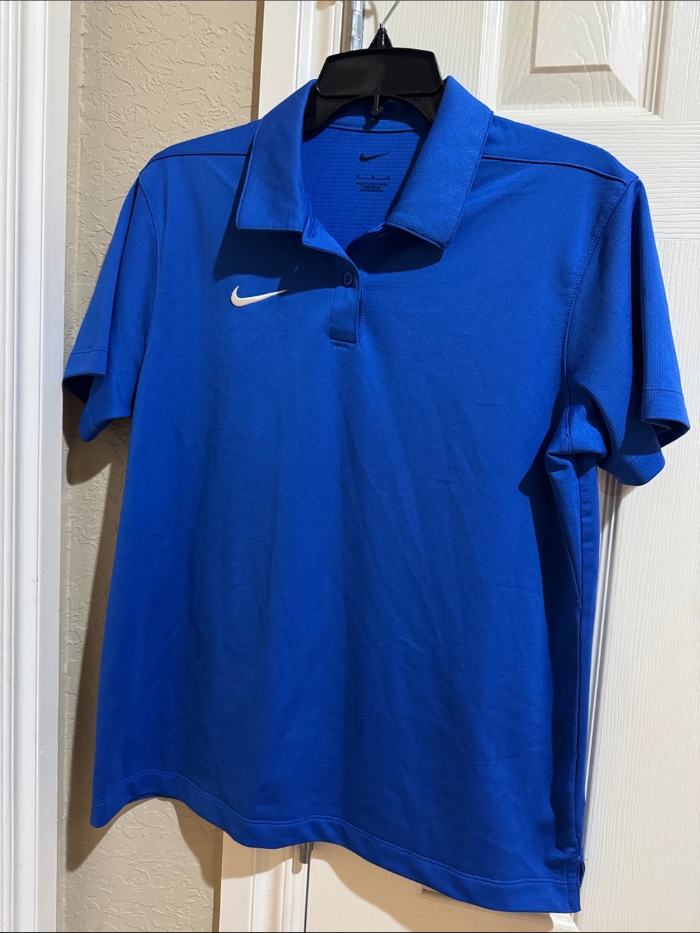 Nike Royal Blue Athletic Polo with White Swoosh. Great for men/women golf